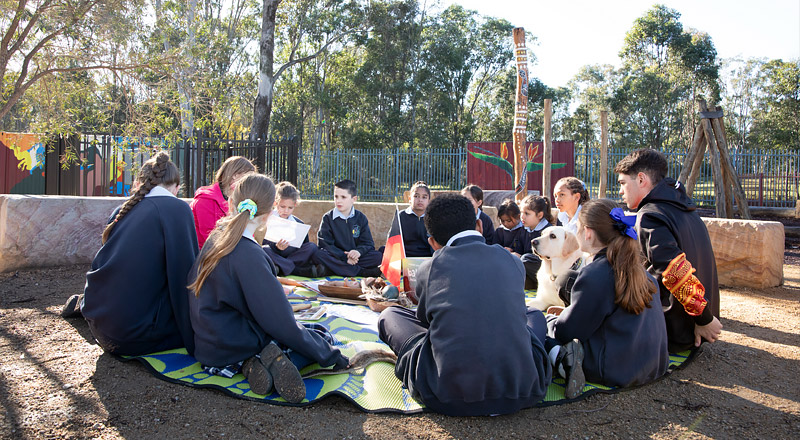 Trinity Catholic Primary Kemps Creek students in yarning circle