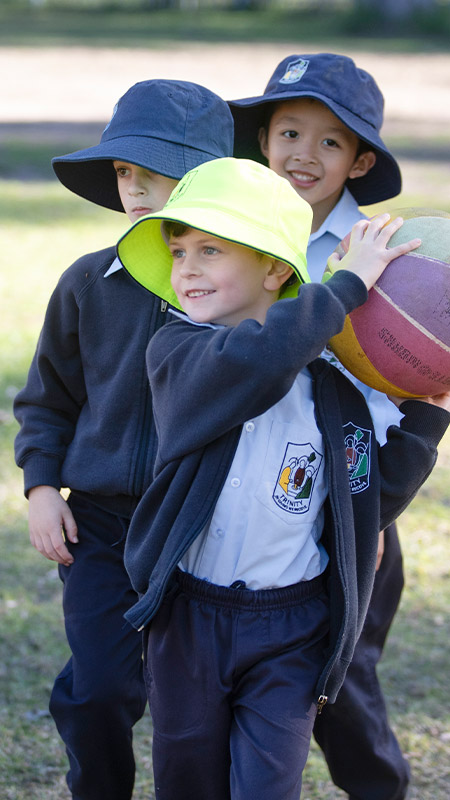 Trinity Catholic Primary School Students playing ball