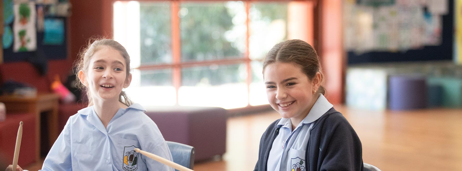 Students drumming at Trinity Catholic Primary Kemps Creek