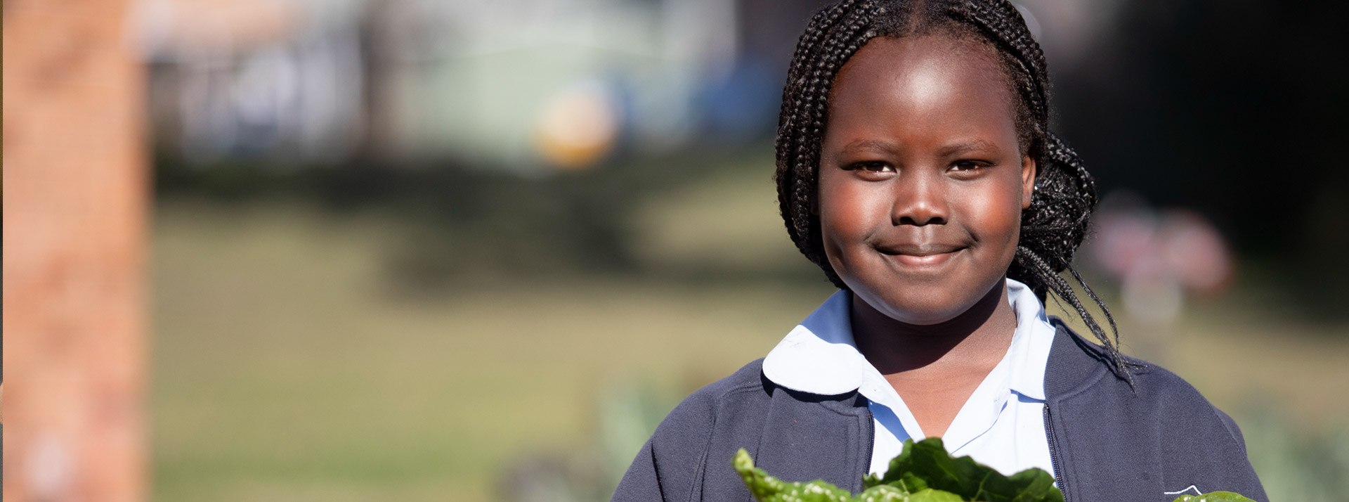 Trinity Catholic Primary Kemps Creek student gardening