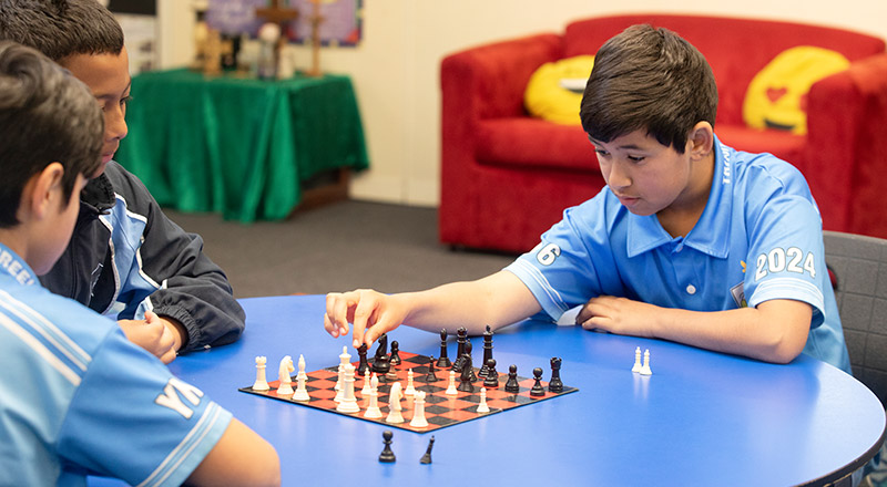 Trinity Catholic Primary School Kemps Creek students playing chess